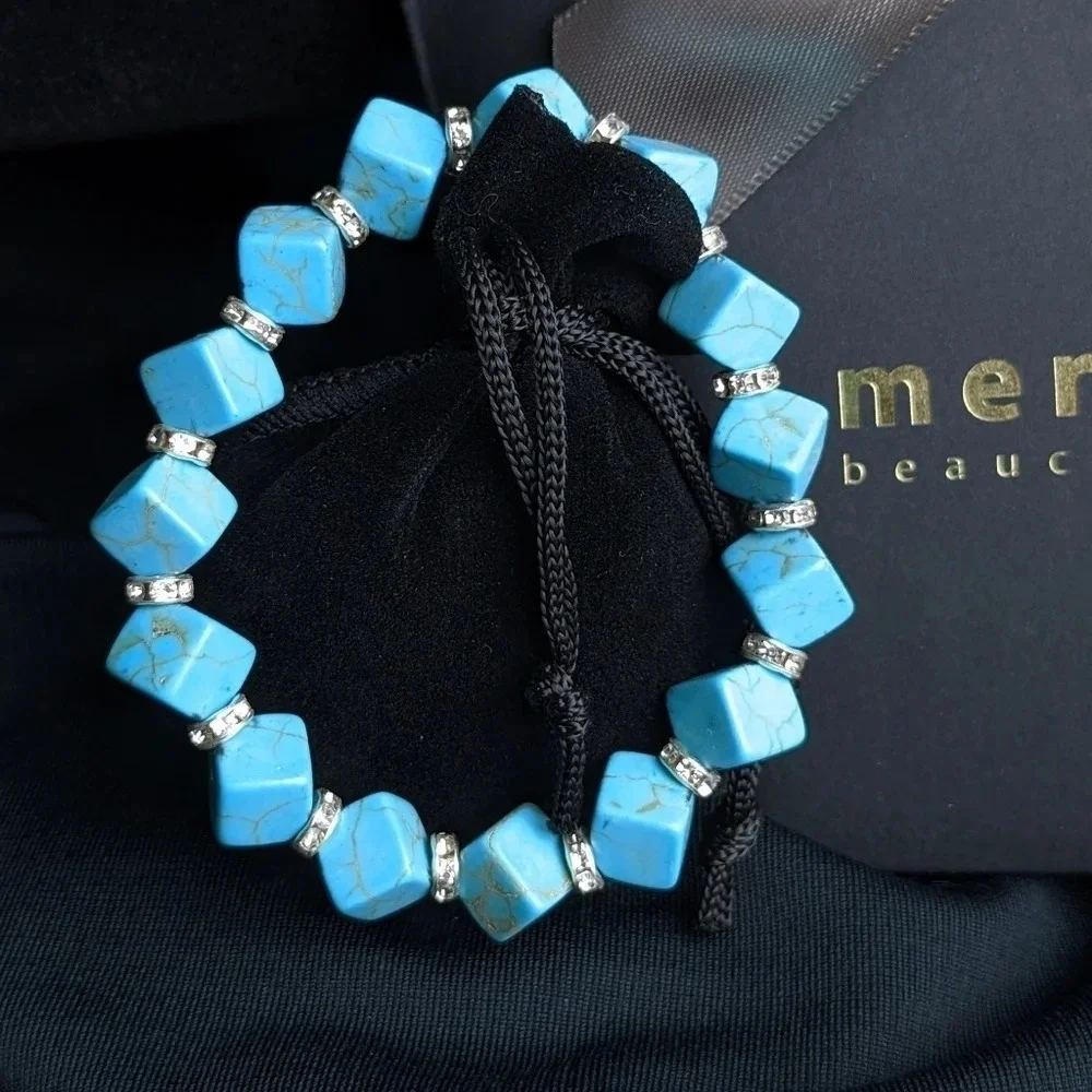 Pretty faux turquoise color beaded bracelet with CZ accents, cube shape beads